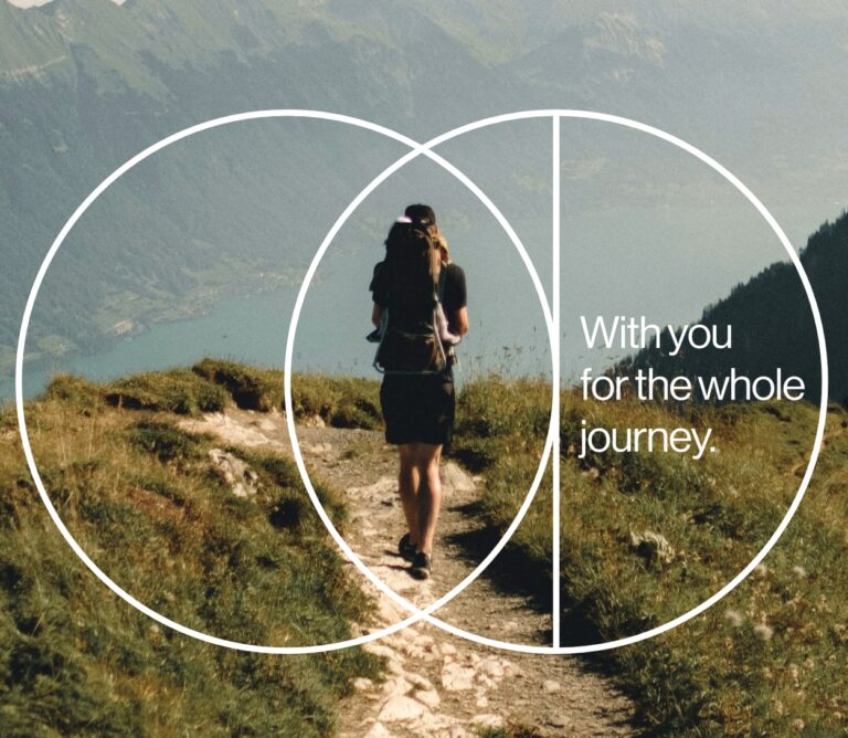 A person with a rucksack hikes on a mountain trail; graphic circles overlap with the text "With you for the whole journey.