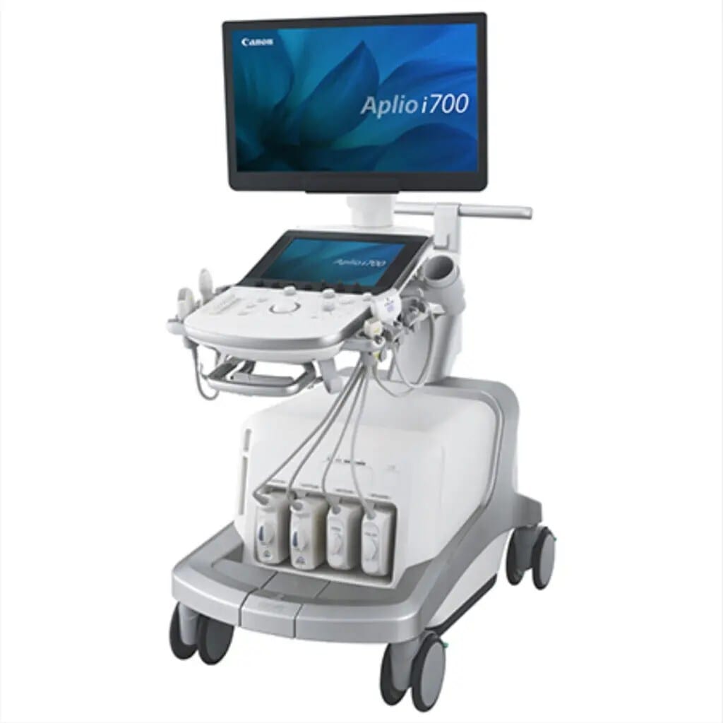 Canon Aplio i700 ultrasound machine with monitor, control panel, multiple probes, and wheels for manoeuvrability.